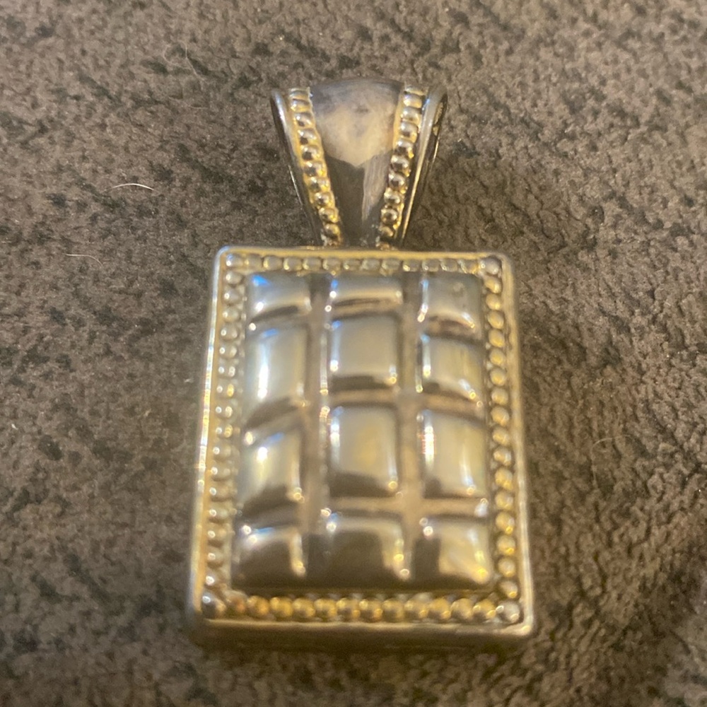 Silver-tone Pendant with Gold Trim. Marked BEST on the back.